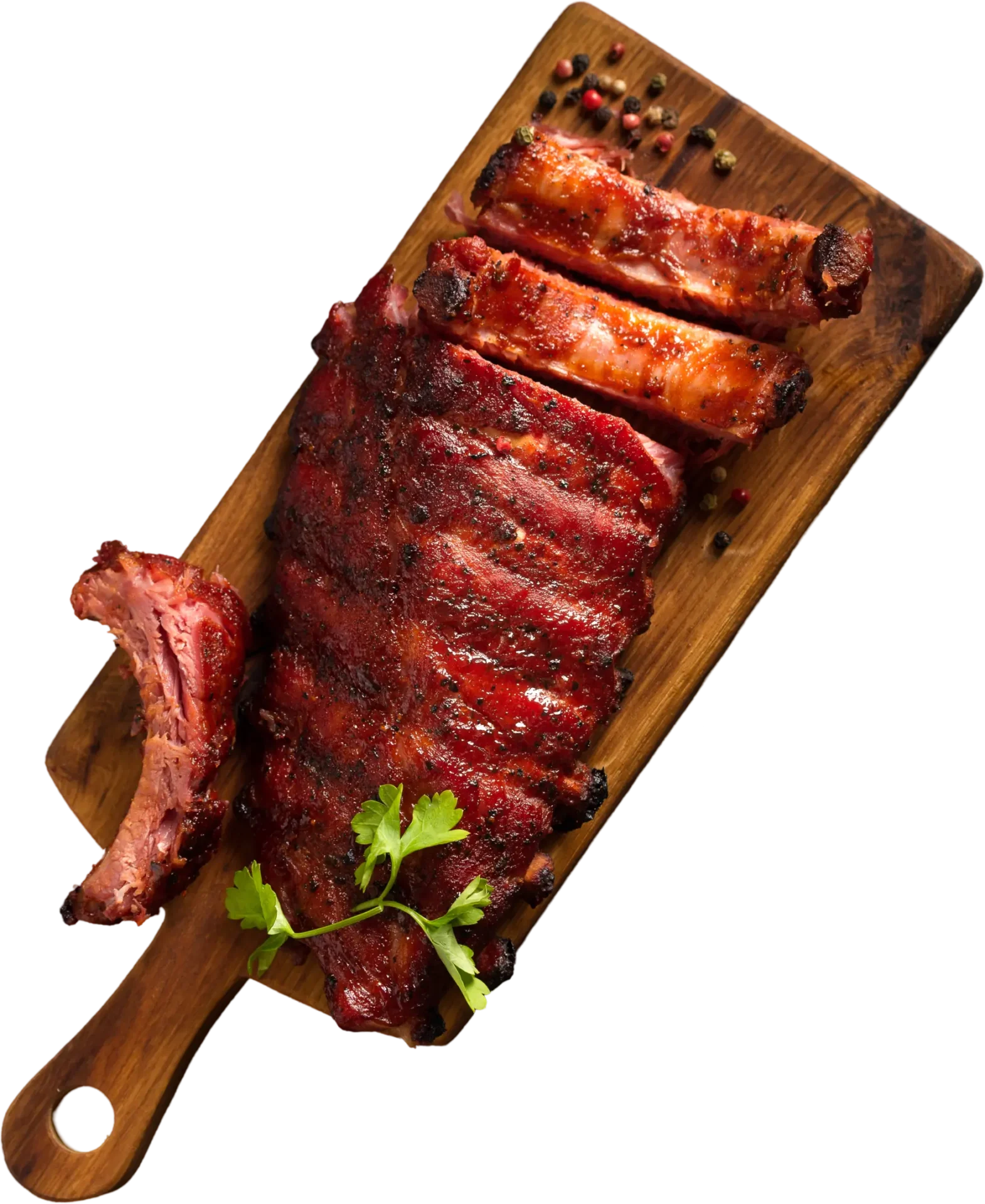 Delicious BBQ ribs on wooden board.
